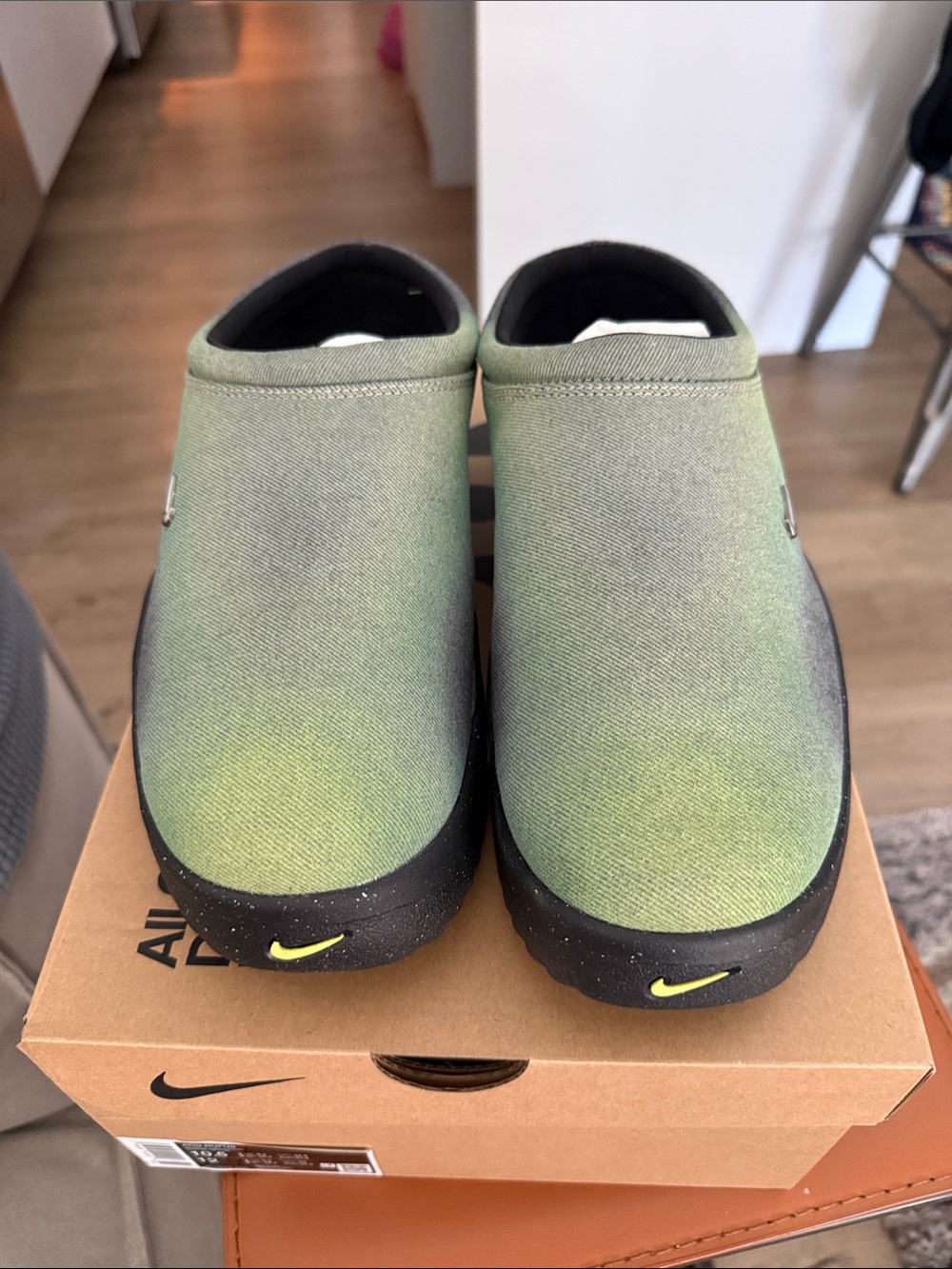 Nike Olive Green Slip-On Loafers with Black Sole and Yellow Swoosh